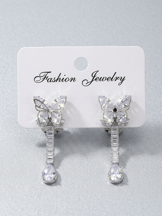 Handmade Turkish butterfly drop earrings with decorative butterfly-shaped design by GARIMAS.