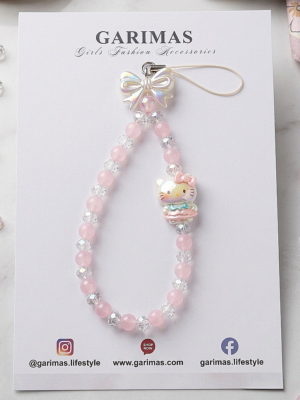 Pink Hello Kitty mobile charm features a beaded wrist strap adorned with an iridescent bow